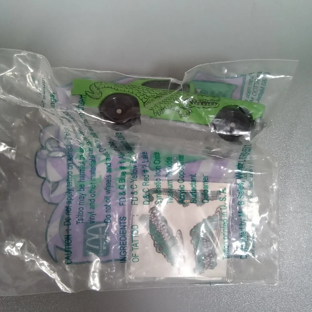 Vintage 1993 McDonalds Hot Wheels Tattoo Machines Green Alligator Happy Meal Toy